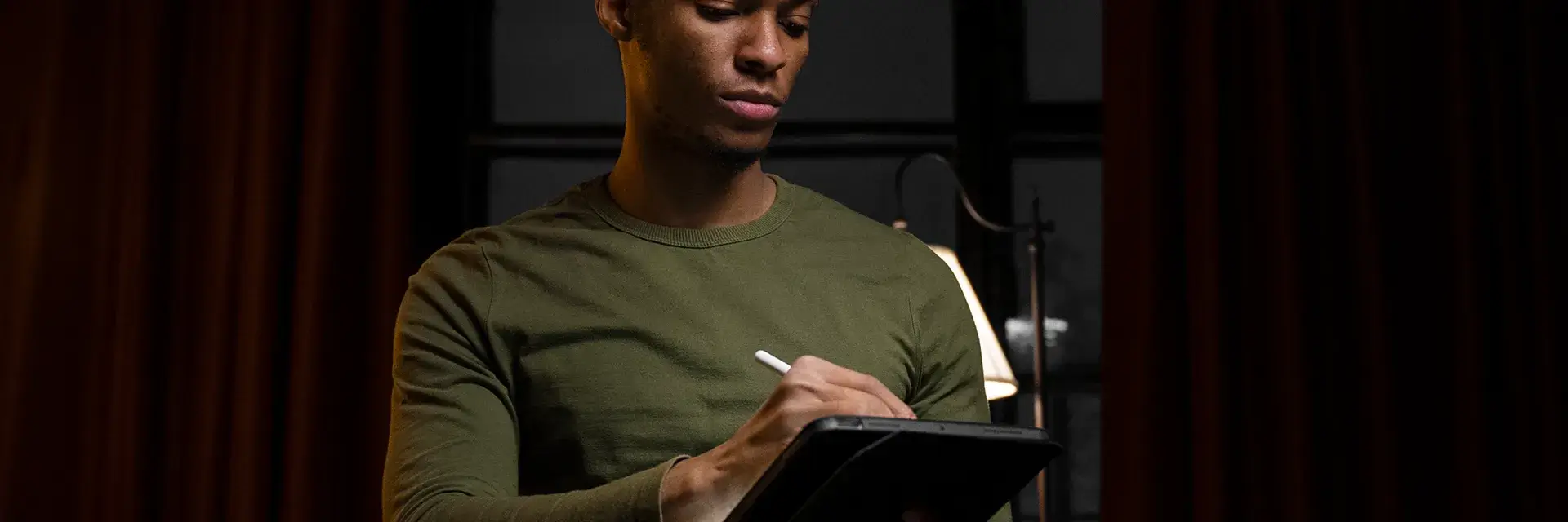 Man performing an audit on a tablet device